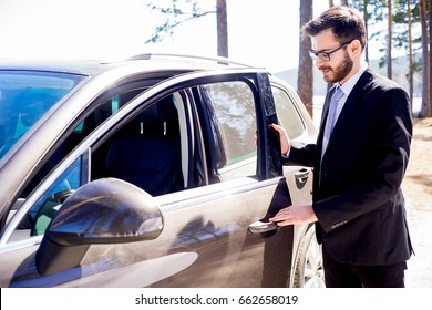 Happy Man Entering His Car