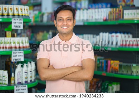 Happy man at grocery store