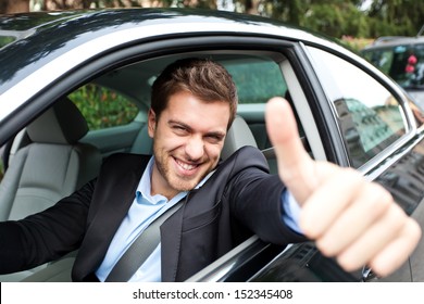 Happy Man In His New Car