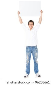 Happy Man Holding Up A Banner Ad - Isolated Over A White Background