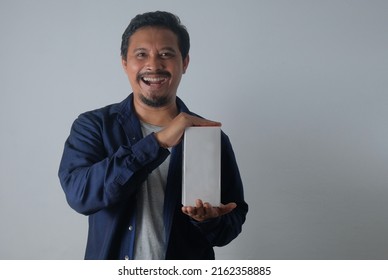 Happy Man Holding Box In The Hand