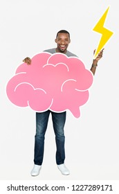 Happy Man Holding A Brain Icon And A Lightning Bolt