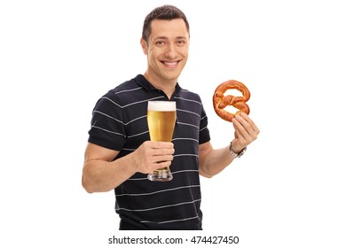 Happy Man Holding A Pretzel And A Pint Of Beer Isolated On White Background