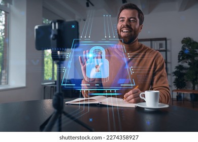 Happy man is making video blog using smartphone on a tripod explaining, teaching, master class people in room. Concept of online stream, business education, conference call. Lock Security info seminar - Powered by Shutterstock