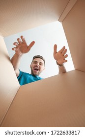 Happy Man With Open Box, View From Inside