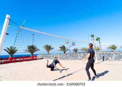 Happy Man Playing Beach Volleyball, Summer Fun And Sport Activity