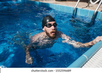 Happy Man In Private Swiming Pool In Front Of His House