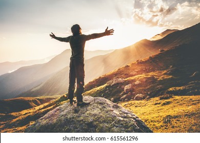 Happy Man Raised Hands At Sunset Mountains Travel Lifestyle Emotional Concept Adventure Summer Vacations Outdoor Hiking Mountaineering Harmony With Nature