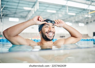 Happy, man or relax in swimming pool with cap or goggles in sports wellness, training or exercise in body muscle. Workout, fitness or swimmer athlete with smile, water competition goals or healthcare - Powered by Shutterstock