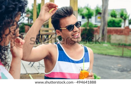 Similar – Glücklicher Mann mit Sonnenbrille lacht bei der Sommerparty.