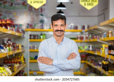 Happy man at supermarket store - Powered by Shutterstock