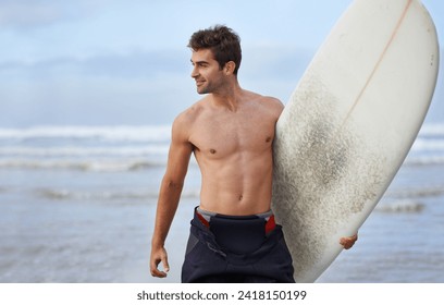 Happy man, surfboard and beach for fitness, waves or exercise in outdoor hobby, surfing or practice. Active young male person or surfer smile with board for training, seaside or ocean coast in nature - Powered by Shutterstock