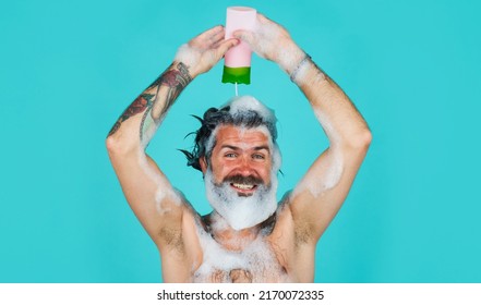 Happy Man Taking Shower. Bearded Guy Pouring Shampoo Or Conditioner On Head. Washing Hair. Haircare.