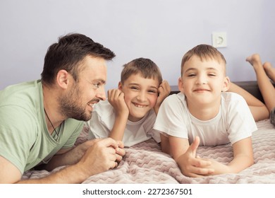 happy man with three children boys - Shutterstock ID 2272367501