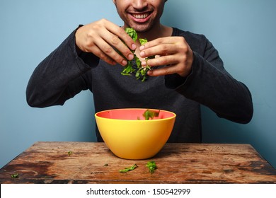 Happy Man Tossing Salad