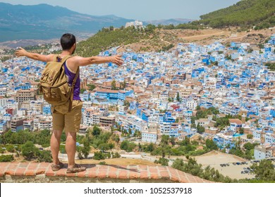 Happy Man Tourist In The Blue City Of Chefchaouen, Morocco