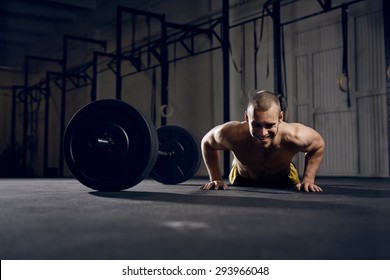 Happy Man Training Burpees At Gym