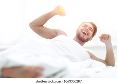 happy man waking up in the morning