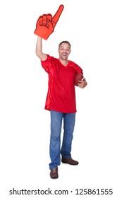 Happy Man Wearing Foam Finger And Holding Rugby Ball On White Background