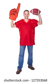 Happy Man Wearing Foam Finger And Holding Rugby Ball On White Background