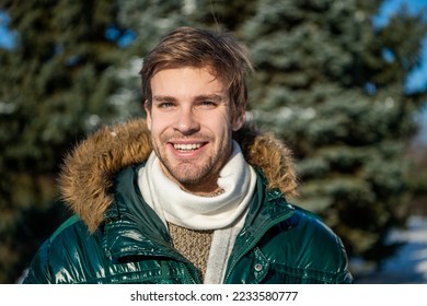 happy man in winterwear jacket. man in winterwear outdoors. stylish man in winterwear
