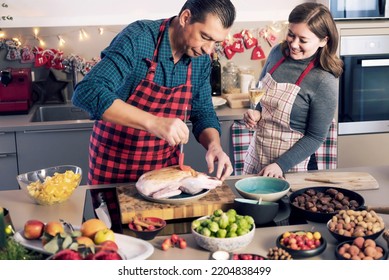 Happy Man And Woman Cooking Together Traditional Dinner For Christmas At Home Kitchen