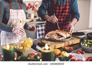 Happy Man And Woman Cooking Together Traditional Dinner For Christmas At Home Kitchen