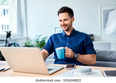 Happy Man Working At Home, Drinking Coffee