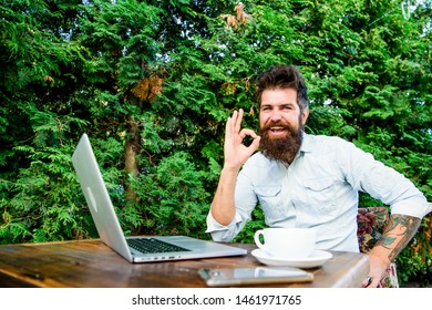 happy man working on laptop. agile business. Business success. perfect deal. office worker. Successful businessman. brutal bearded hipster at coffee break. everything is ok. Business man using device