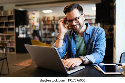 Happy Man Working On Laptop. Technology People Work Study Concept