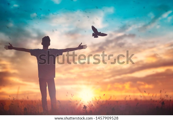 Happy\
man worship for peace on morning view. Christian inspire praise God\
on good friday background. Self confidence empowerment on  courage\
love concept strength wellbeing wisdom\
financial
