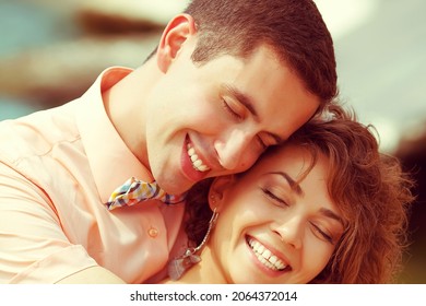 Happy Marriage Concept. Portrait Of A Beautiful Laughing (smiling) Couple Of Hipsters In Trendy Clothing. Wedding Day. Close Up. Outdoor Shot