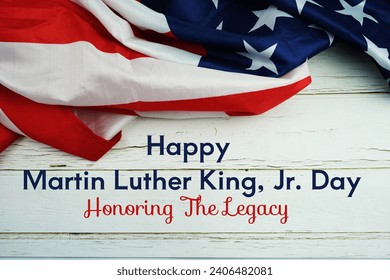 Happy Martin Luther King Jr Day text messege  with USA flag on wooden background - Powered by Shutterstock