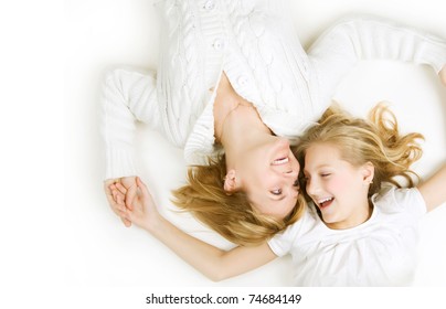 Happy Mather With Daughter Over White