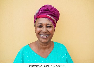 Happy Mature African Woman Looking At Camera - Focus On Face