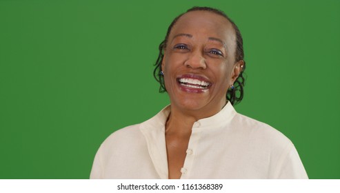 Happy Mature Black Woman Laughing On Green Screen