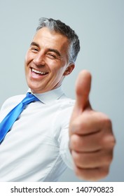 Happy Mature Business Man Showing Thumbs Up Sign