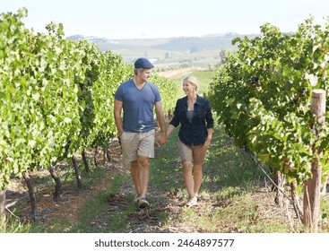 Happy, mature couple and holding hands at vineyard in Italy for bonding, hiking and conversation. Smile, senior man and woman walking at sustainable wine farm for travel adventure or holiday trip - Powered by Shutterstock