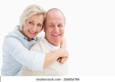 Happy Mature Couple Smiling At Camera On White Background