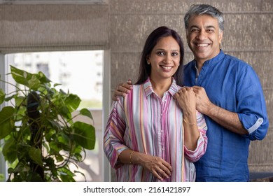 Happy mature couple spending leisure time together at home - Shutterstock ID 2161421897