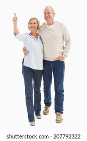 Happy Mature Couple Walking Together On White Background