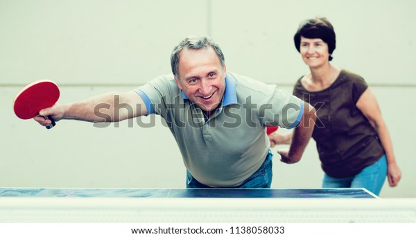 Happy Mature Man Woman Playing Table Stock Photo Edit Now 1138058033