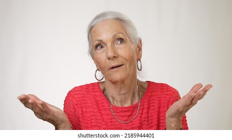 Happy Mature Middle Aged Elderly Woman Talking To The Camera.