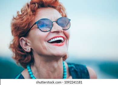 Happy mature woman enjoying life