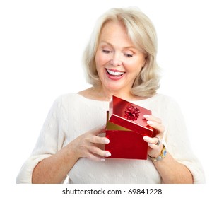 Happy  Mature Woman With A Gift. Isolated Over White Background