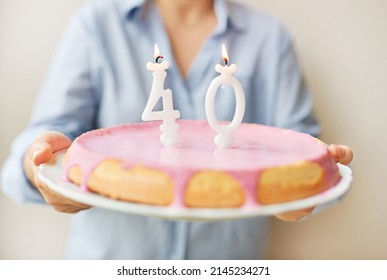 Happy Middle Age 40 Year Old Woman Holding Cake With Candles