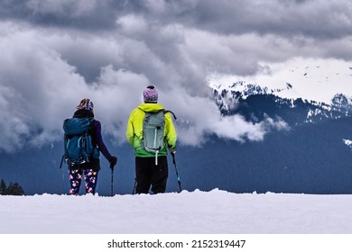 Happy Middle Age Couple In Mountains. Storm Clouds In Whistler. Garibaldi Park. British Columbia. Canada