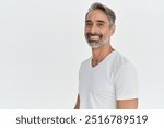 Happy middle aged 45 years old man isolated on white studio background. Confident mature handsome bearded gray-haired male model wearing t-shirt looking at camera. Portrait. Copy space.