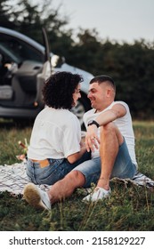 Happy Middle Aged Couple Having Picnic Outdoors, Man And Woman On Romantic Weekend