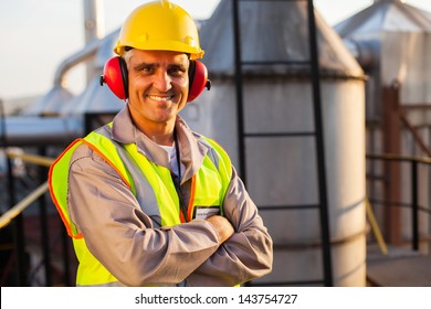 Happy Middle Aged Oil Chemical Industry Worker Inside Plant